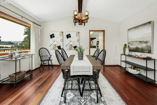 dining room featuring a notable chandelier, vaulted ceiling, and dark wood-type flooring