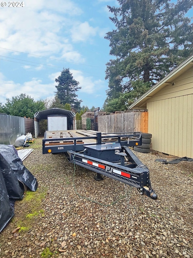 view of yard with a carport