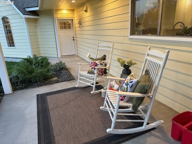 view of patio featuring a porch