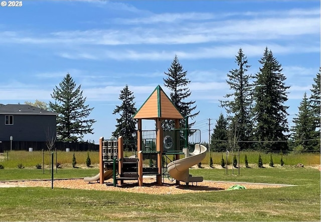 view of play area with a yard