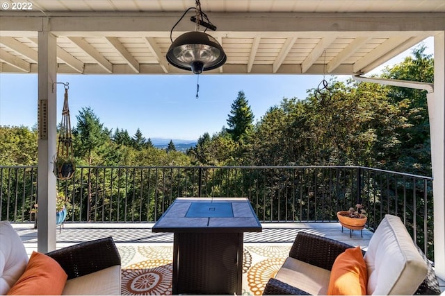 view of patio featuring a balcony