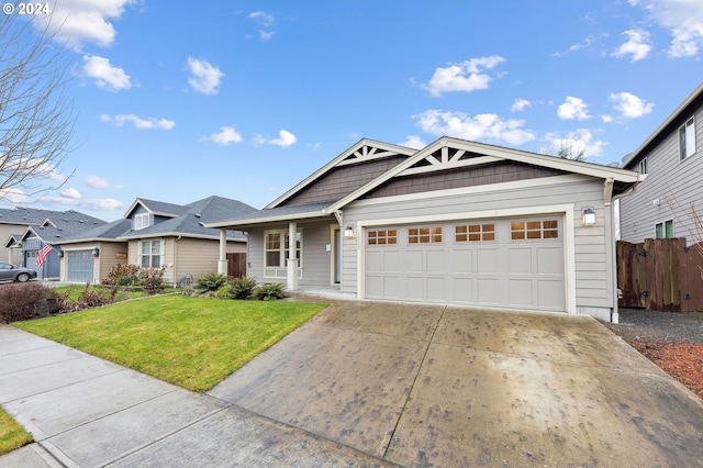 view of front facade featuring a front lawn and a garage