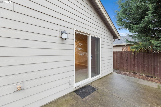 property entrance with a patio