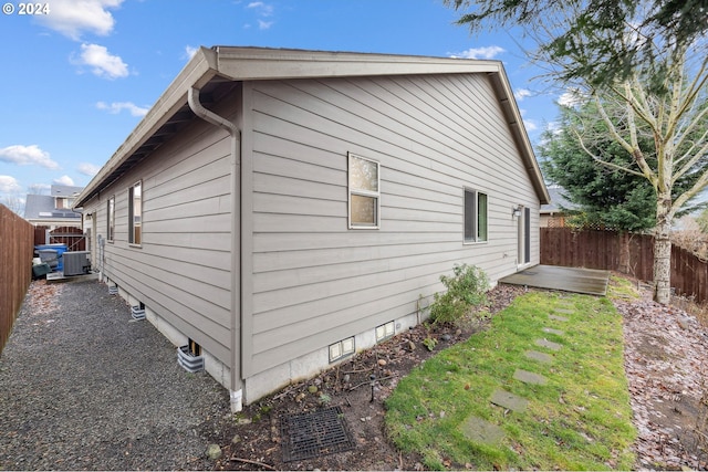 view of property exterior featuring central AC