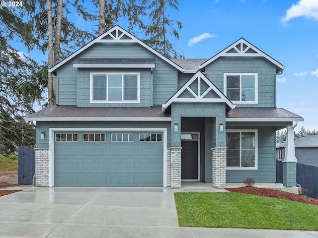 craftsman inspired home featuring a garage