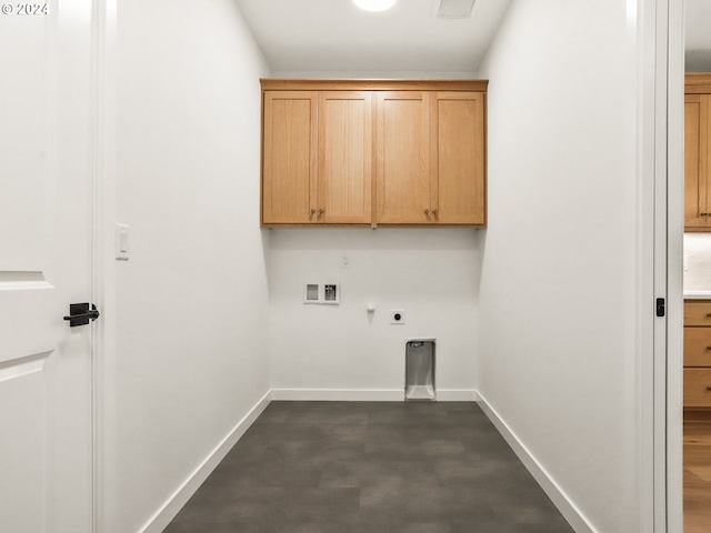 laundry area featuring washer hookup, gas dryer hookup, hookup for an electric dryer, and cabinets