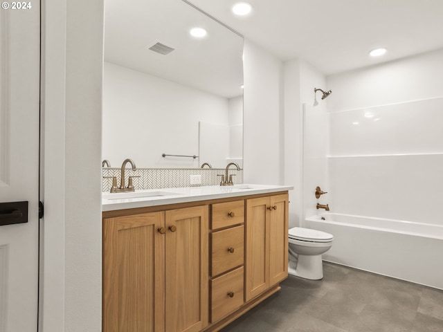 full bathroom featuring vanity,  shower combination, and toilet