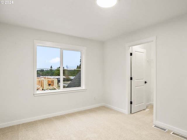 view of carpeted spare room