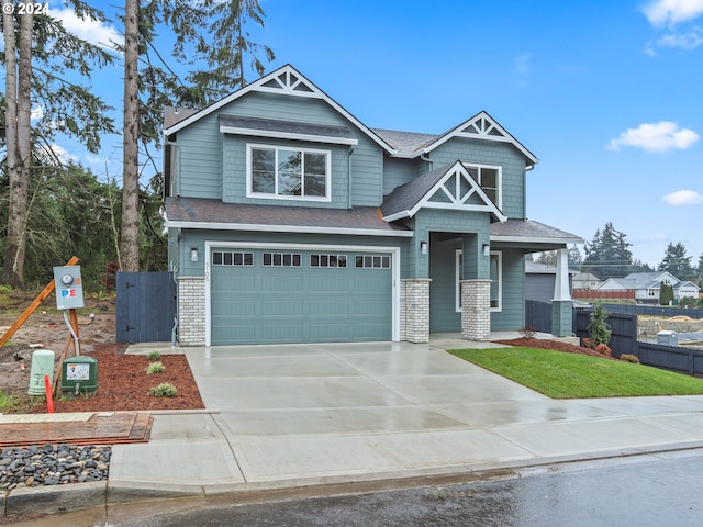 craftsman-style home featuring a garage