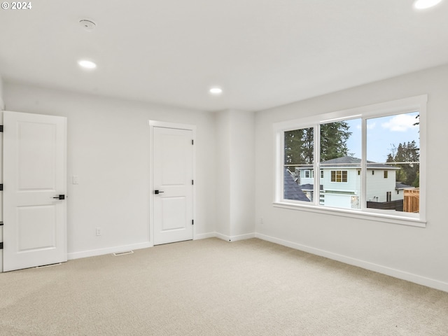 empty room with carpet floors