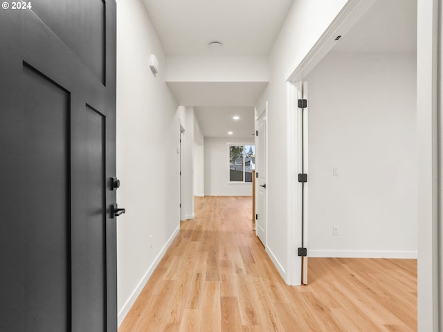 hallway featuring light wood-type flooring