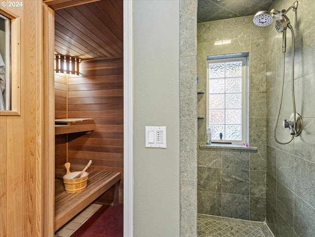 view of sauna with wood walls