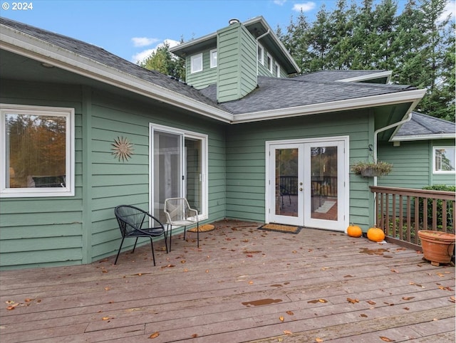 wooden deck featuring french doors