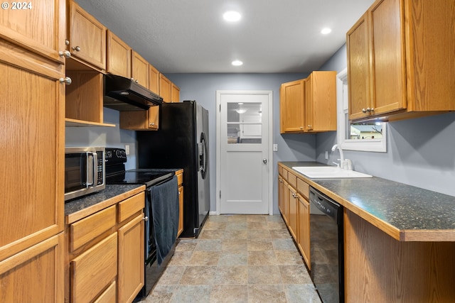 kitchen with sink and black appliances