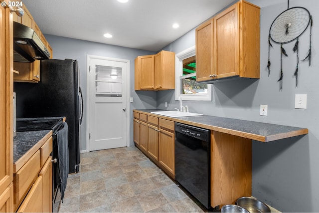 kitchen featuring black appliances, a kitchen breakfast bar, ventilation hood, sink, and kitchen peninsula