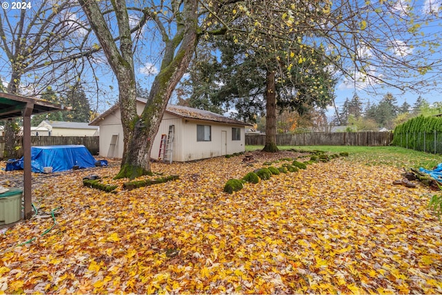 view of yard featuring a covered pool