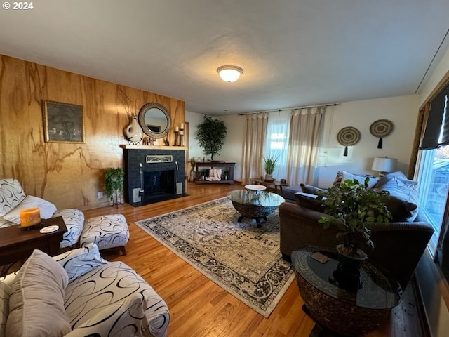 living room with hardwood / wood-style flooring and plenty of natural light