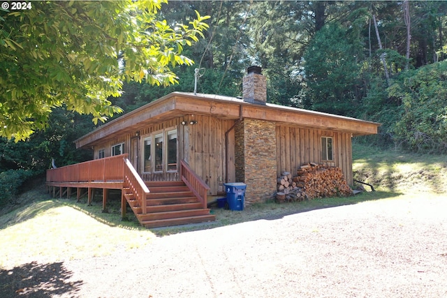 view of front of property with a deck