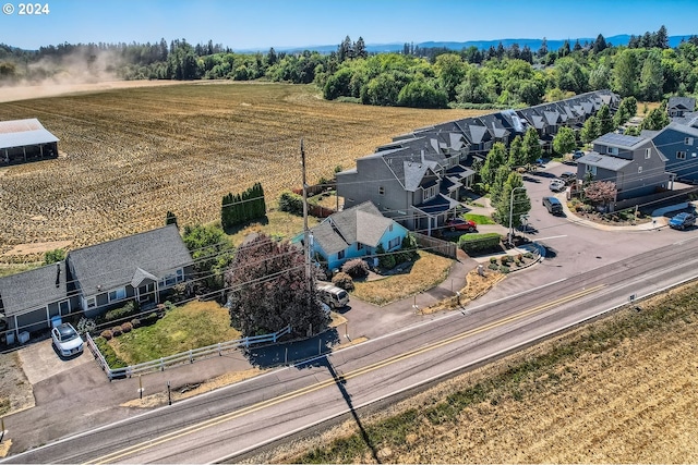 birds eye view of property featuring a rural view