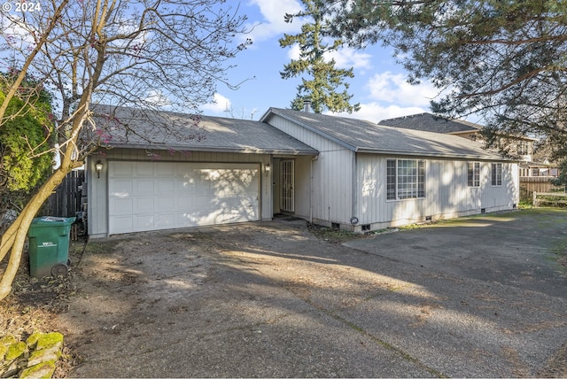 single story home with a garage