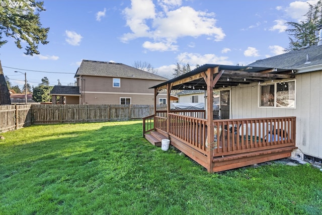 view of yard with a deck