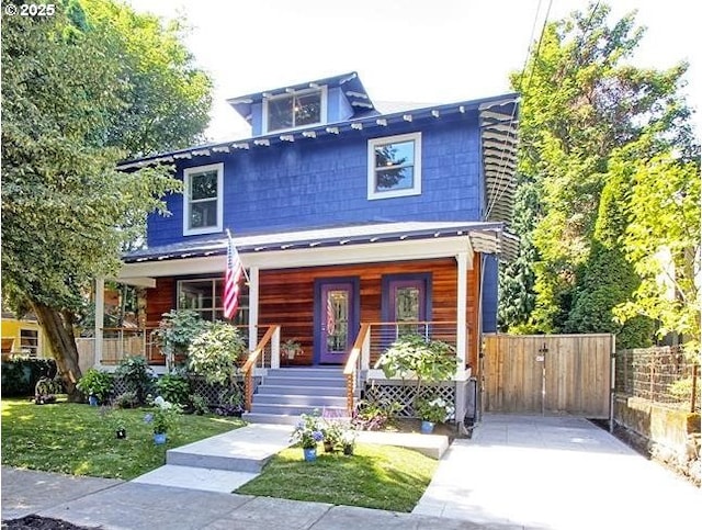 view of front of home featuring covered porch