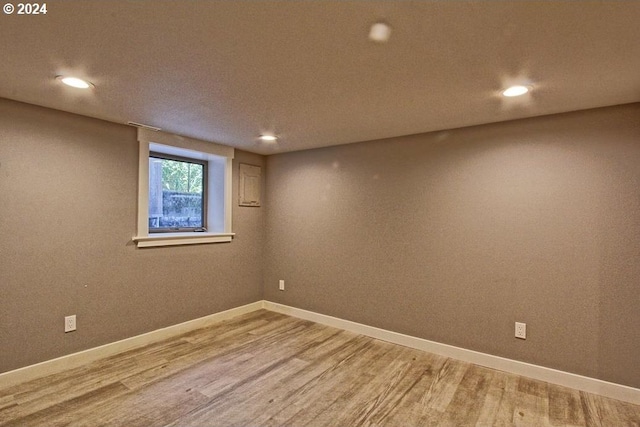 unfurnished room featuring hardwood / wood-style floors