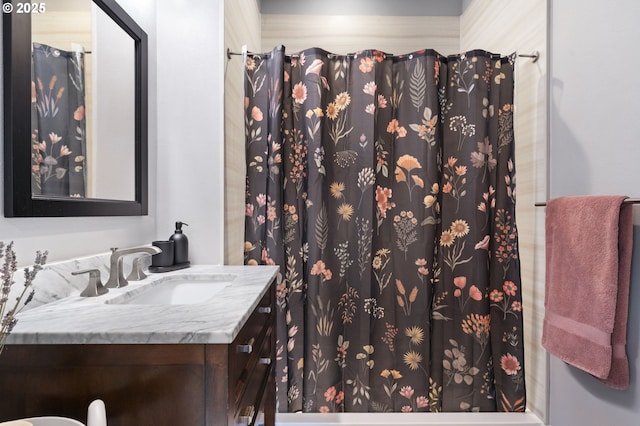 bathroom featuring vanity and a shower with curtain