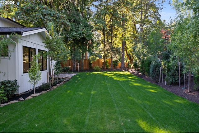 view of yard with fence