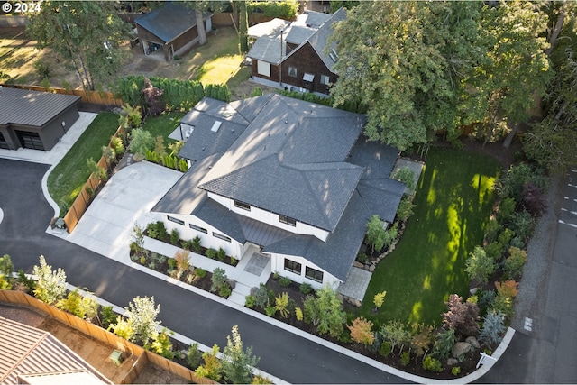 birds eye view of property with a residential view