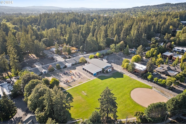 aerial view featuring a view of trees