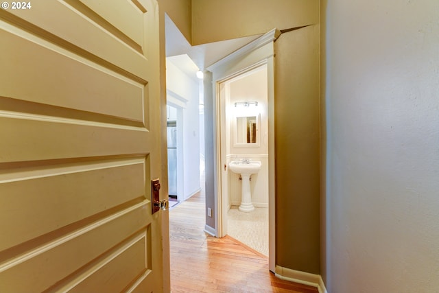 hallway featuring light wood-type flooring