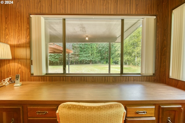 kitchen featuring wooden walls