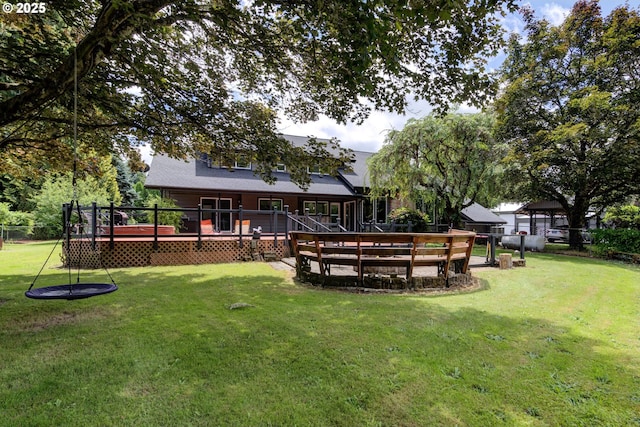 view of yard featuring a wooden deck