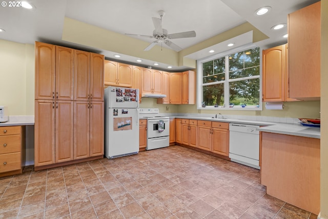 kitchen featuring ceiling fan and white appliances