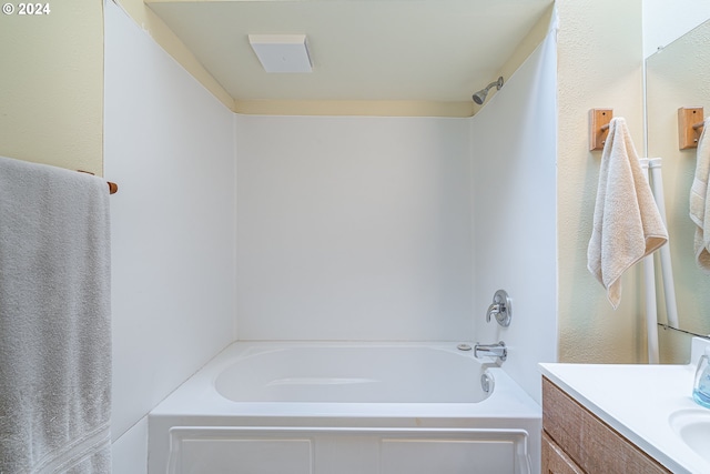 bathroom with shower / bath combination and vanity