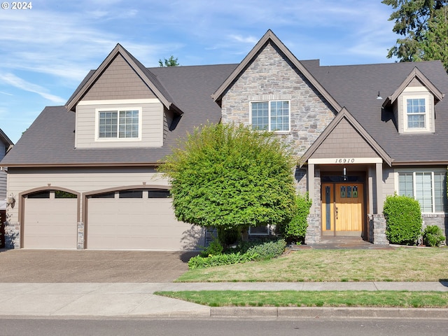 craftsman-style home featuring a garage