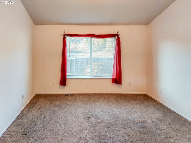 view of carpeted spare room