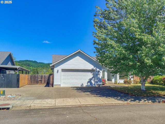 1739 Aspen Run Ave, Sutherlin, OR 97479 - view of front of house featuring asphalt driveway and a garage