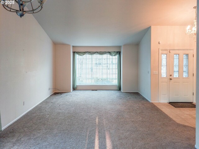 carpeted living room featuring plenty of natural light