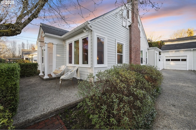 view of property exterior at dusk