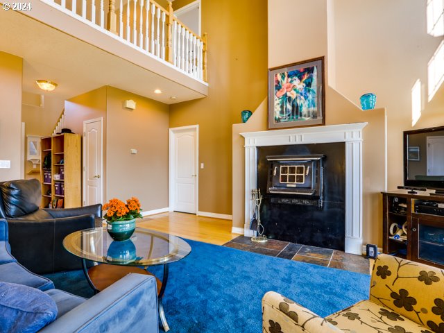 living room with a high ceiling