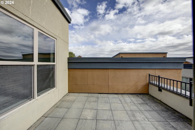view of patio / terrace with a balcony