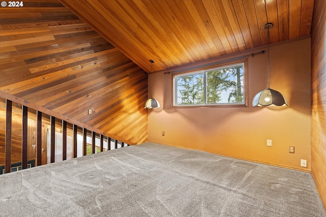 spare room with carpet, wooden ceiling, and vaulted ceiling