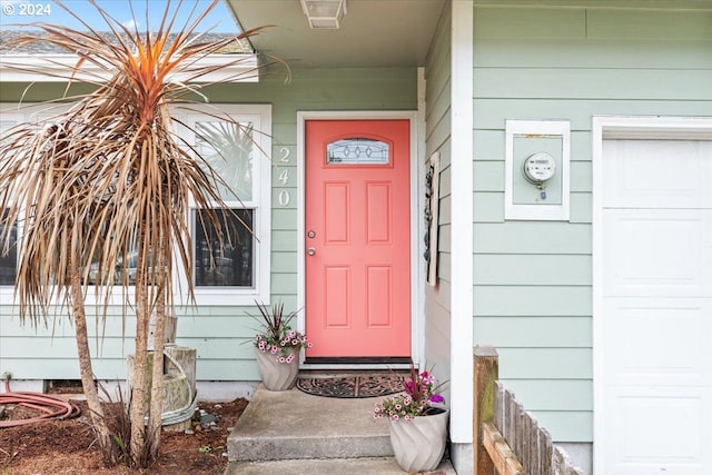 property entrance featuring a garage