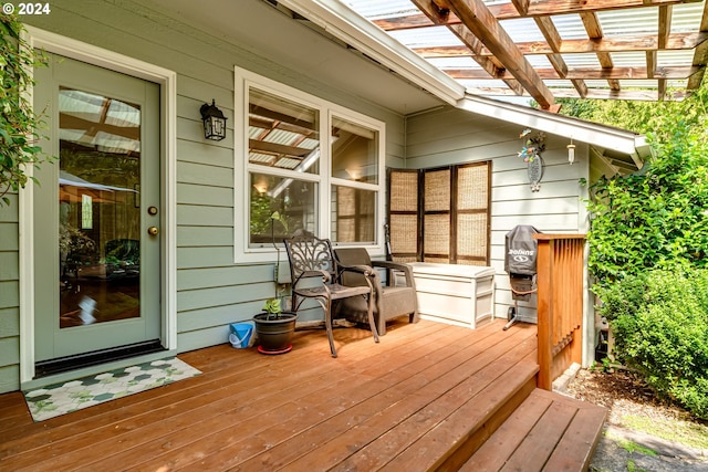 wooden terrace featuring a pergola