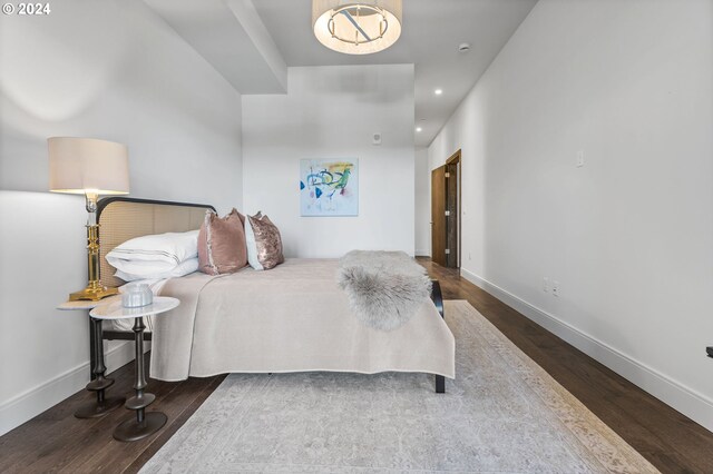 bedroom featuring dark hardwood / wood-style floors