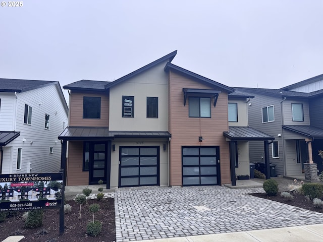 view of front of home featuring a garage