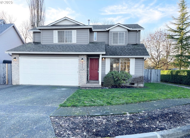 front facade with a front yard and a garage