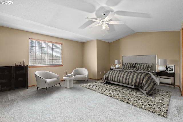 carpeted bedroom featuring ceiling fan and lofted ceiling